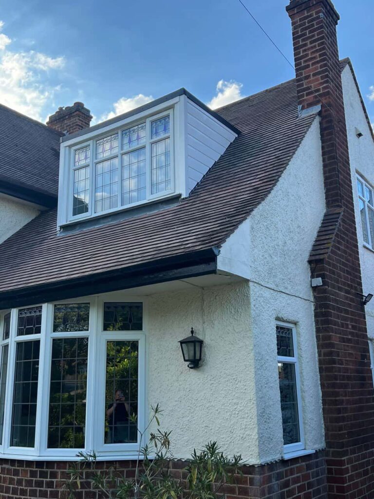 This is a photo of a dormer window which has just had some repairs carried out where the roof and the dormer meet. Works carried out by LJ Roofing Cirencester